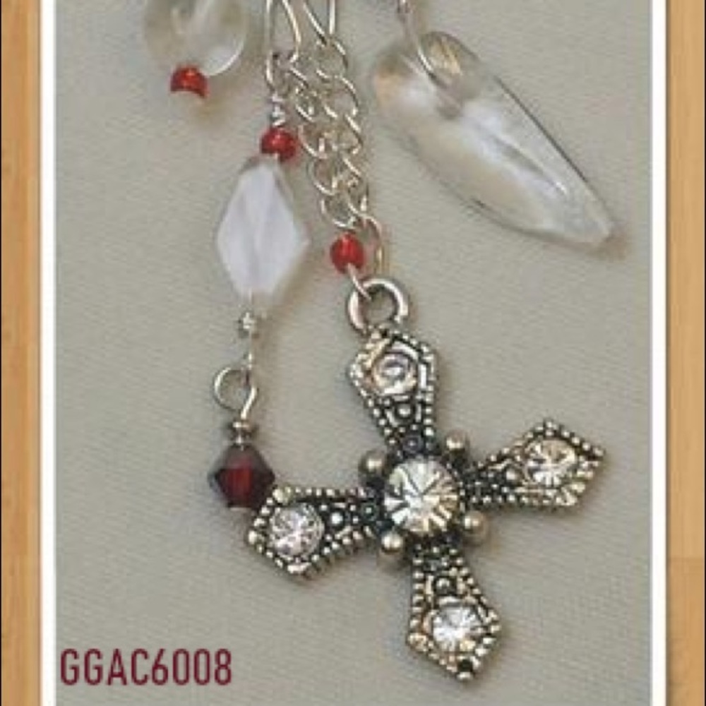 Charm for wallets, handbags or car mirror